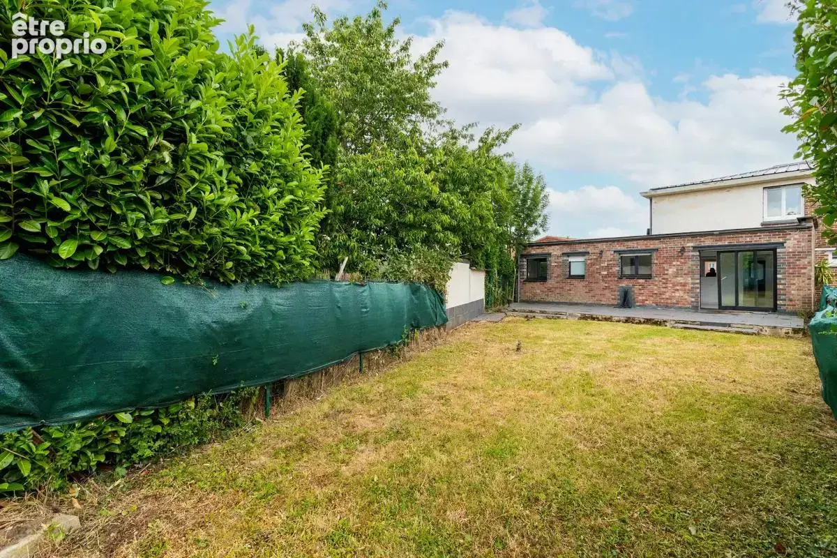 Maison de 6 pièces de 115 m² située à Hem - photo 3