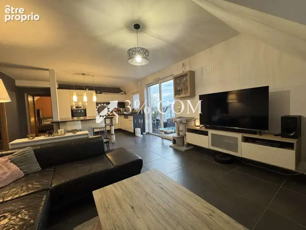 3%COM Très beau F3 avec terrasse- parking- cave - photo 7