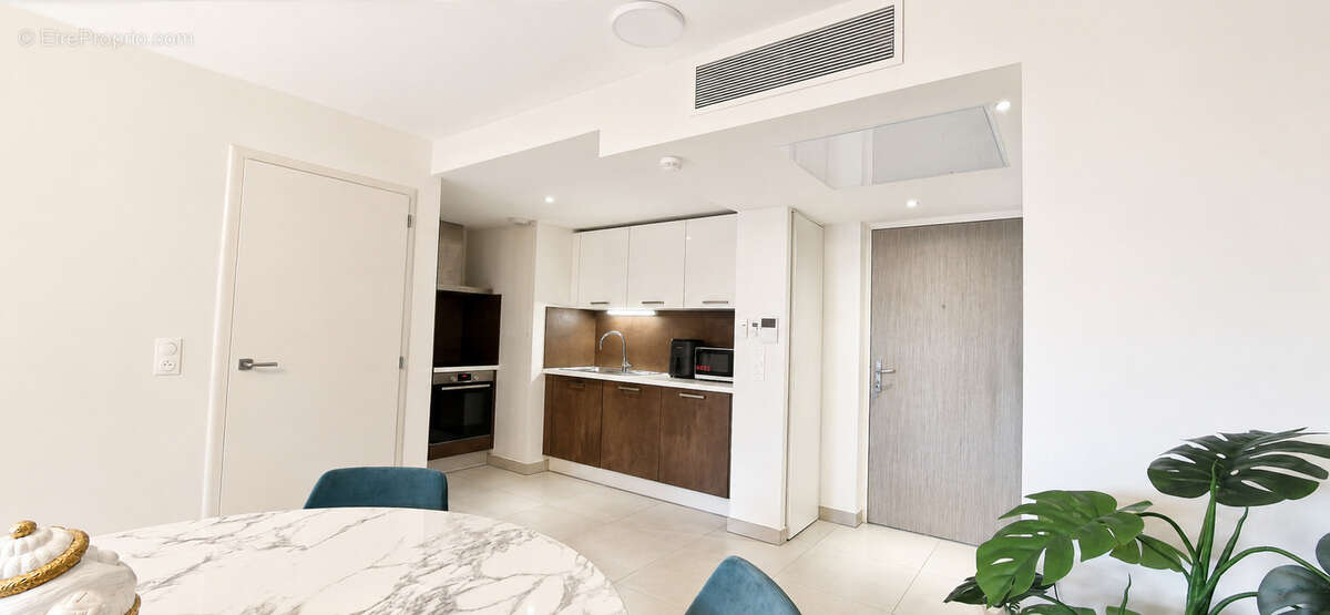 EXCLUSIVITE - Grand 2 pièces en rez de jardin + garage - photo 3