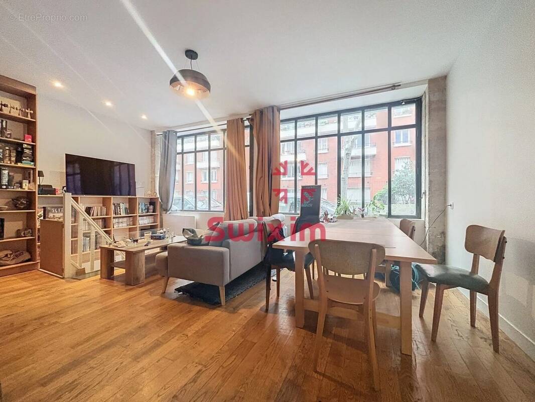 3472849_896983_photo_0.jpg - Appartement à PARIS-11E