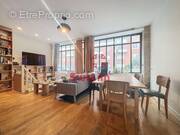 3472849_896983_photo_0.jpg - Appartement à PARIS-11E