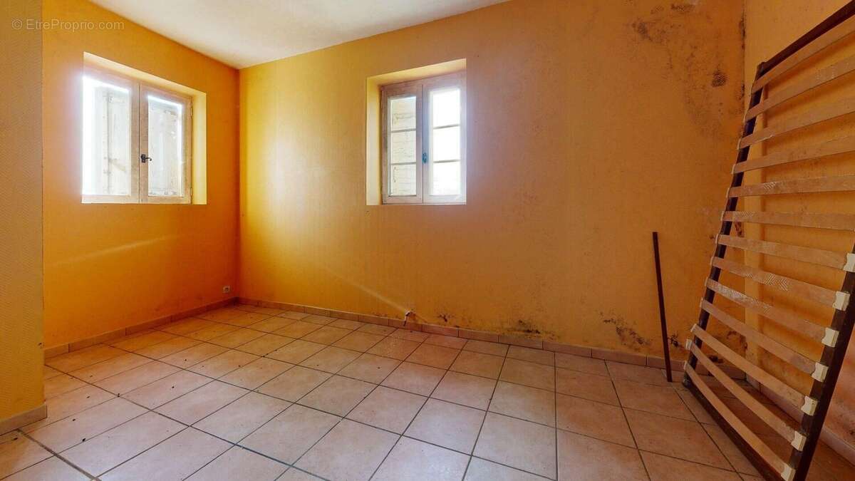 MaisonenpierresavecsesdependancesBedroom 1 - Maison à MONPLAISANT