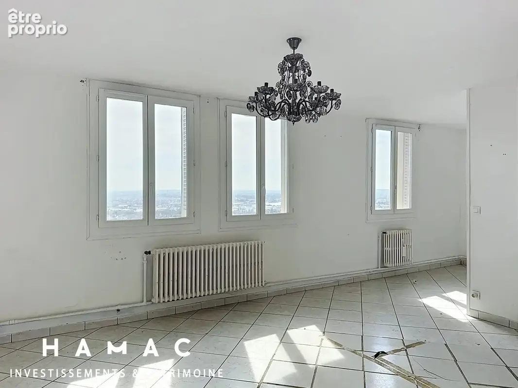 Appartement T4 65 m² dernier étage - photo 2