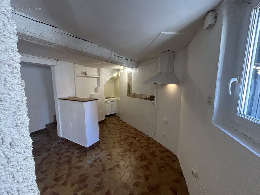 Béziers Centre  Charmante maison de ville en pierres de 63 m² - photo 2