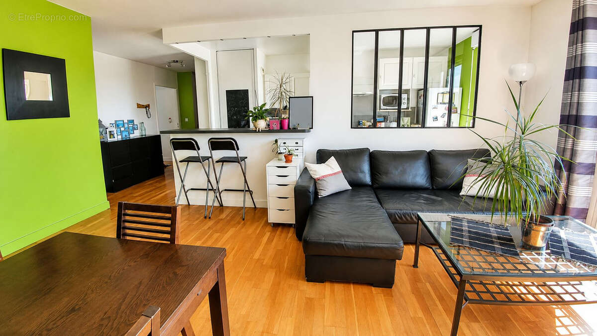 Bel appartement  de 4 pièces en centre ville avec balcon, box et cave - photo 4