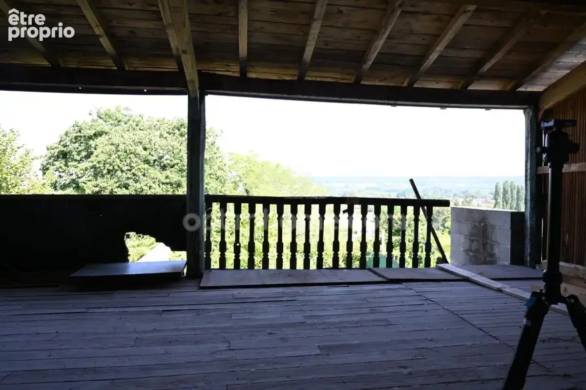 Maison en pierre avec deux logements, terrasse panoramique et potentiel exceptionnel à DOUZILLAC (24) - photo 10