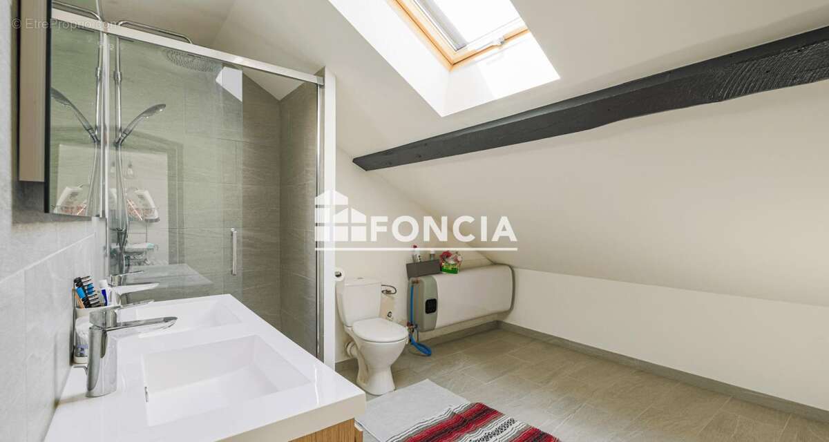 Maison familiale de 109 m² avec jardin – Un cadre de vie privilégié - photo 11