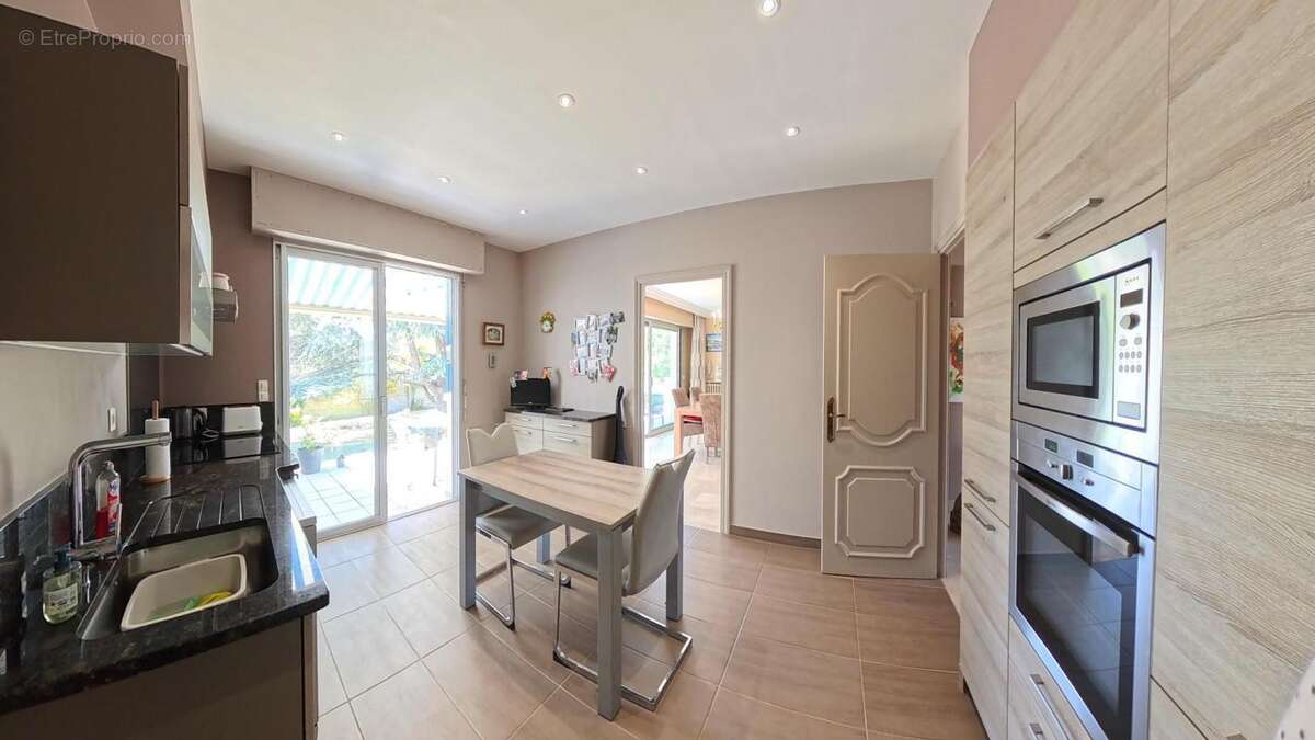 maison d'architecte plain pied 500m des commerces - photo 7