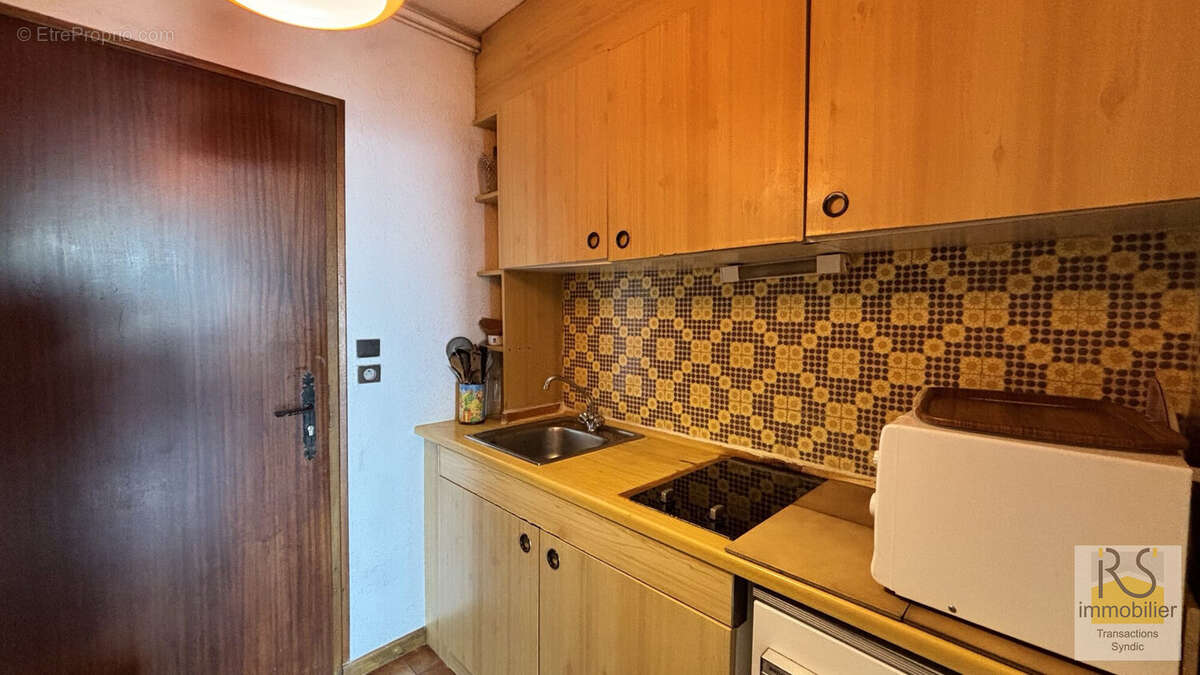 Cuisine  - Appartement à ARACHES-LA-FRASSE