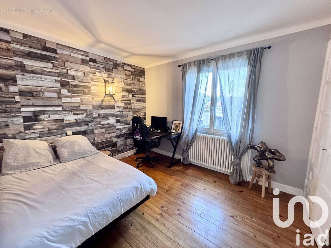 Photo 1 - Maison à LA TALAUDIERE