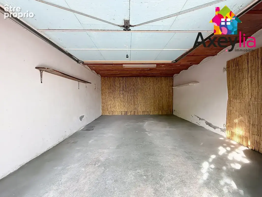 A vendre - riorges - maison élevée sur sous-sol avec deux chambres, garage, terrasse et terrain - photo 14