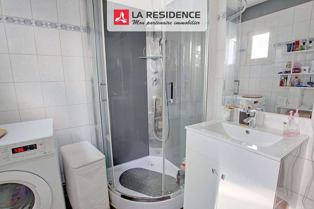 Appartement 58 m² à Le Mesnil-Saint-Denis  - photo 8