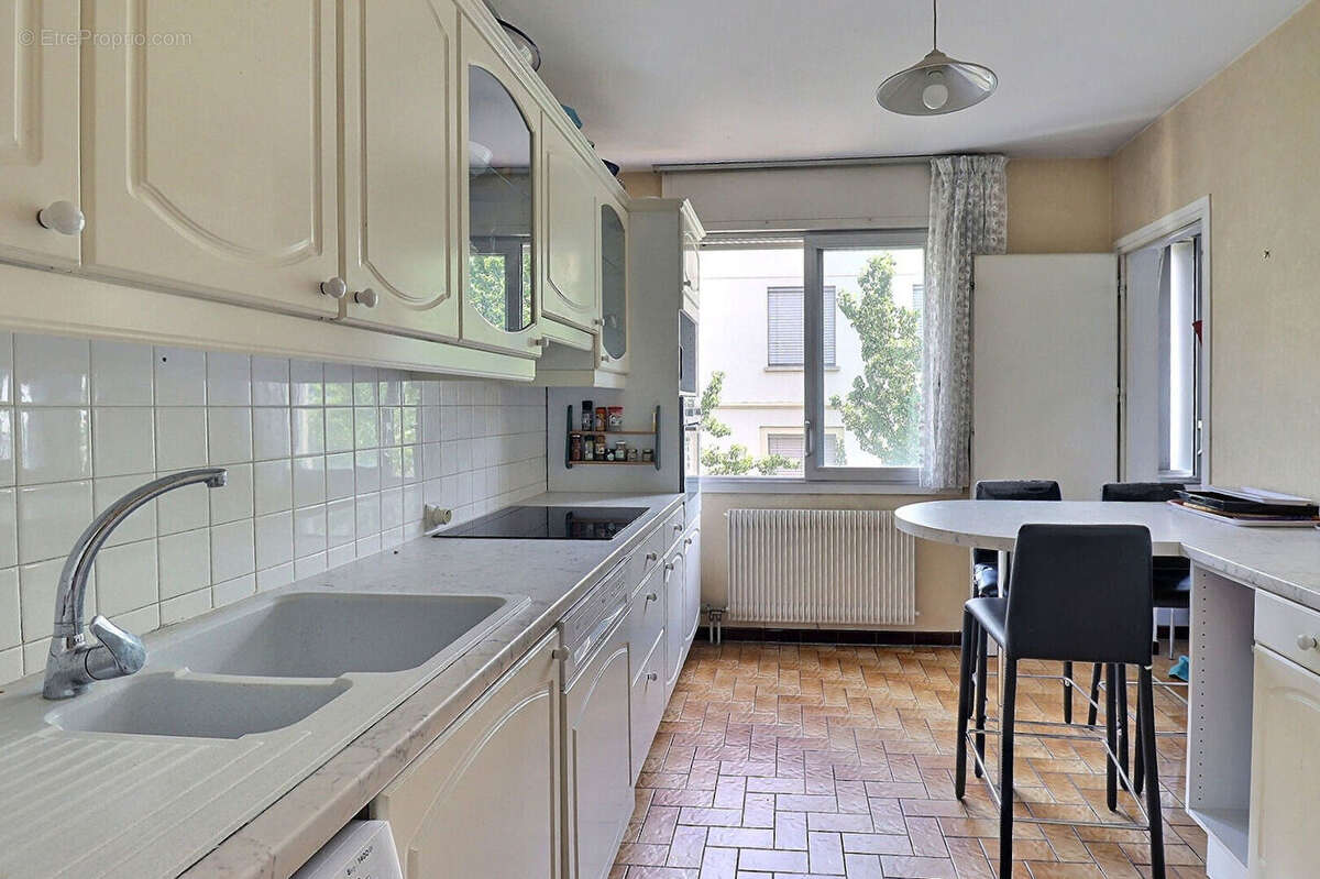 Appartement T4/T5 de 100,50 m2 - Chambéry centre avec balcon, cave et garage - photo 4