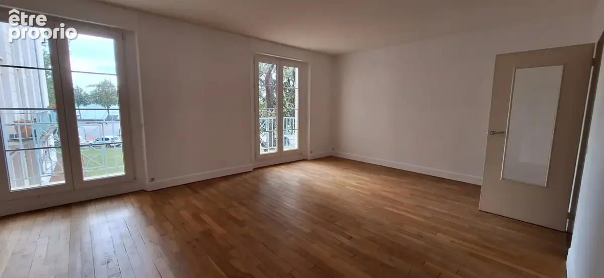 T3 lumineux avec 2 balcons, cave et cellier en centre-ville - photo 4