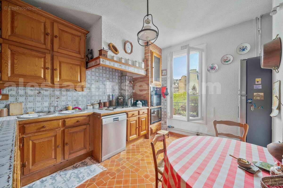 Photo n°10-2 - Appartement à PARIS-14E