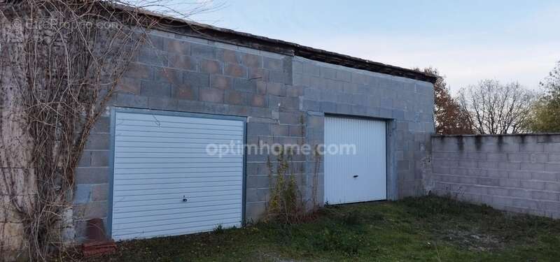 MARTHON Terrain CU de 911 m² clos, avec deux garages fermés - photo 2