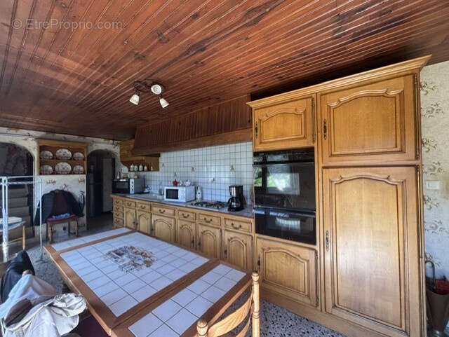 EXCLUSIVITE à AUXY, longère de plain pied avec hangar, étang et parc arboré. - photo 11