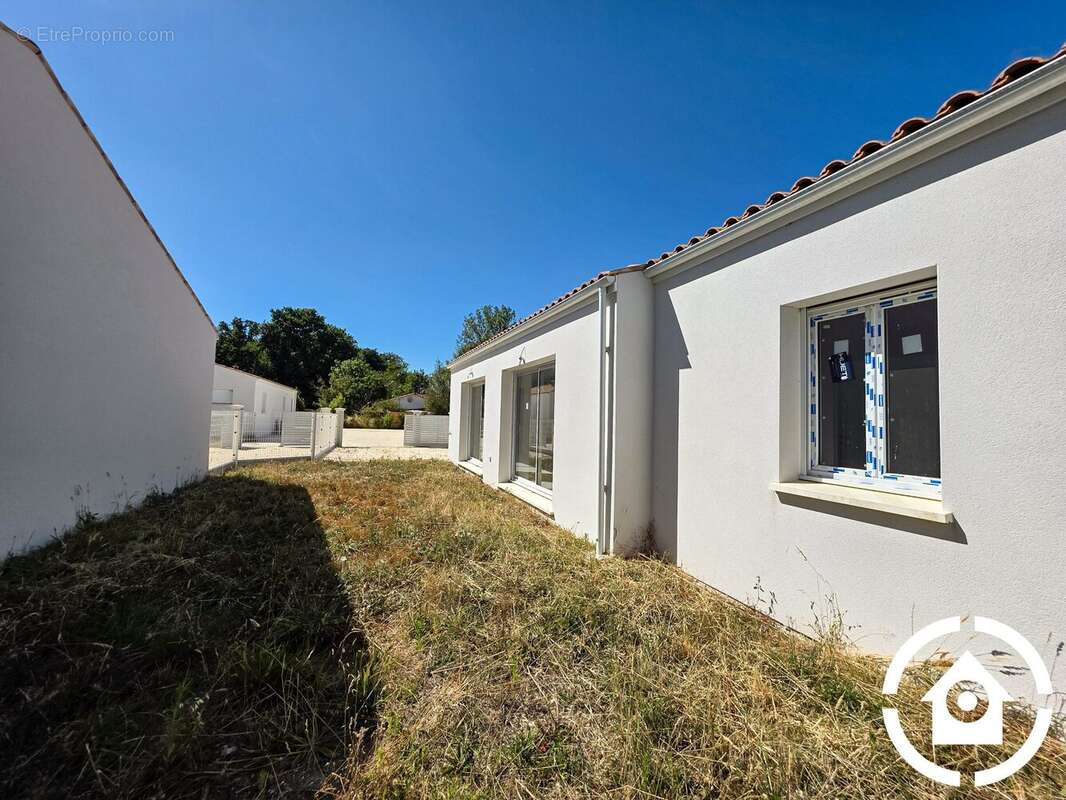 Maison 113 m² à Breuillet  - photo 5