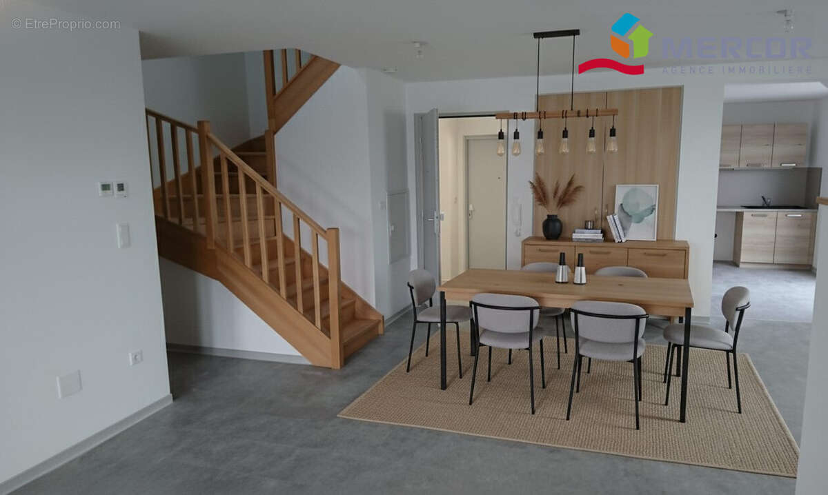 Salle à manger donnant sur la terrasse - Appartement à NEUGARTHEIM-ITTLENHEIM