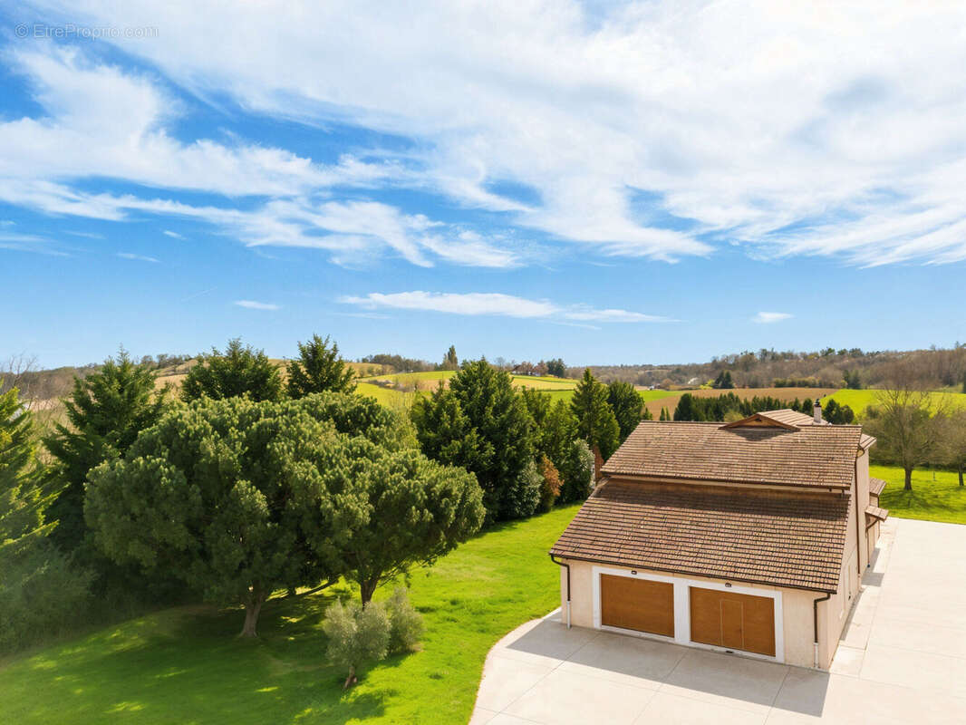 Photo 2 - Maison à SAINT-PIERRE-DE-CHANDIEU