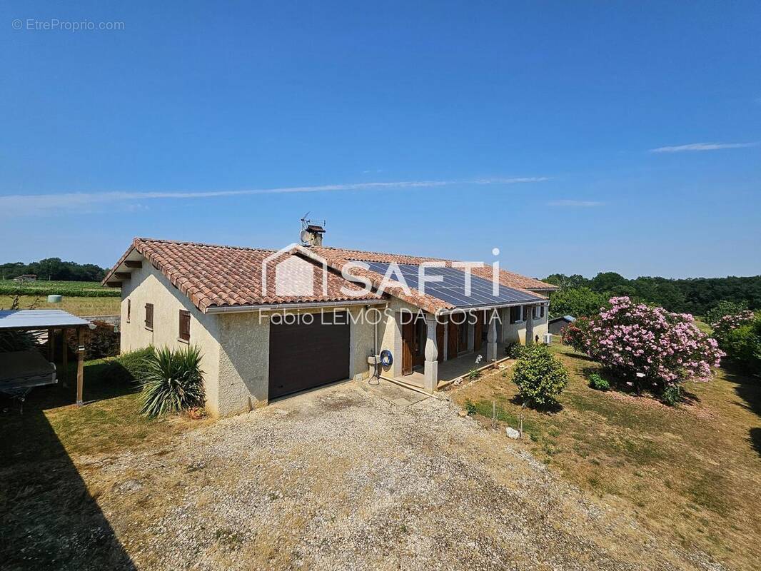 Photo 1 - Maison à CASTELNAU-D'AUZAN