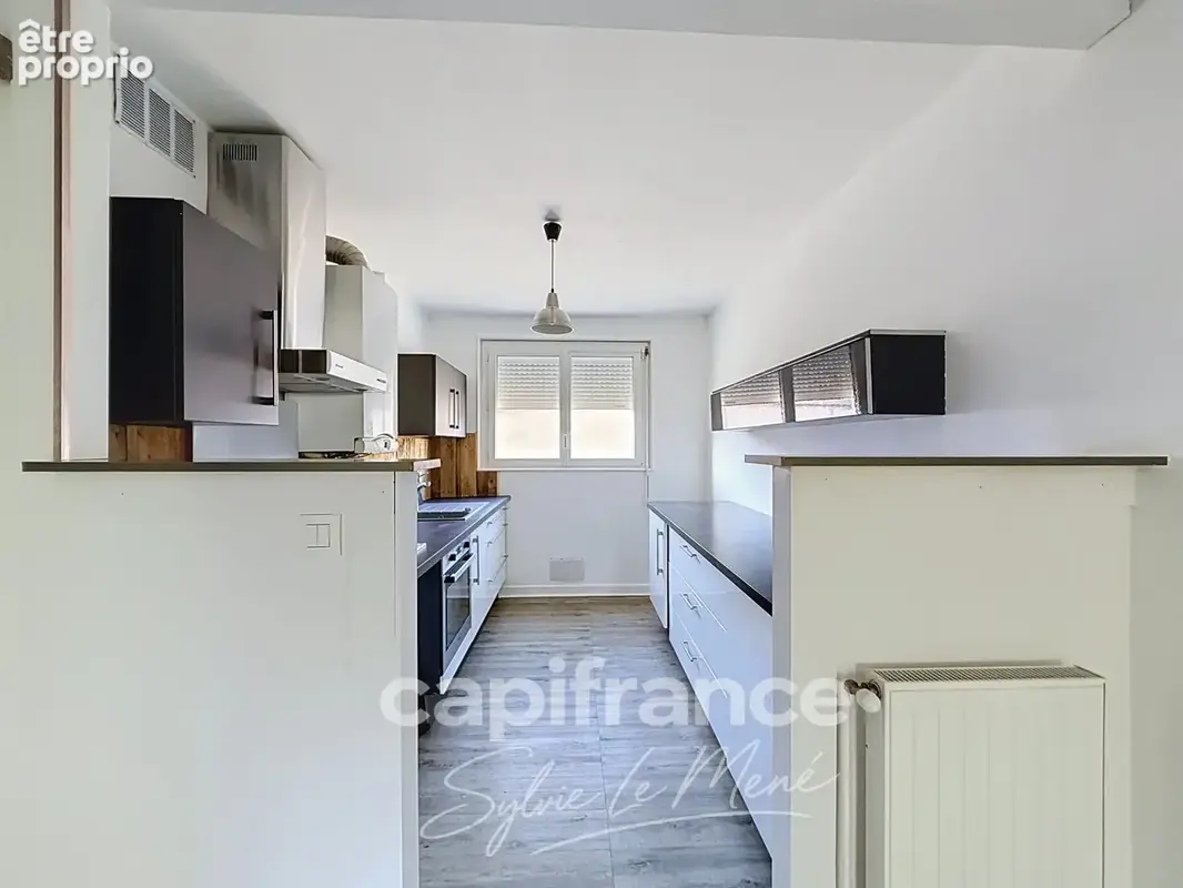 À vendre appartement T3 71 m² à vendre à Pontivy – 2 chambres, balcon, cave et parking - photo 3