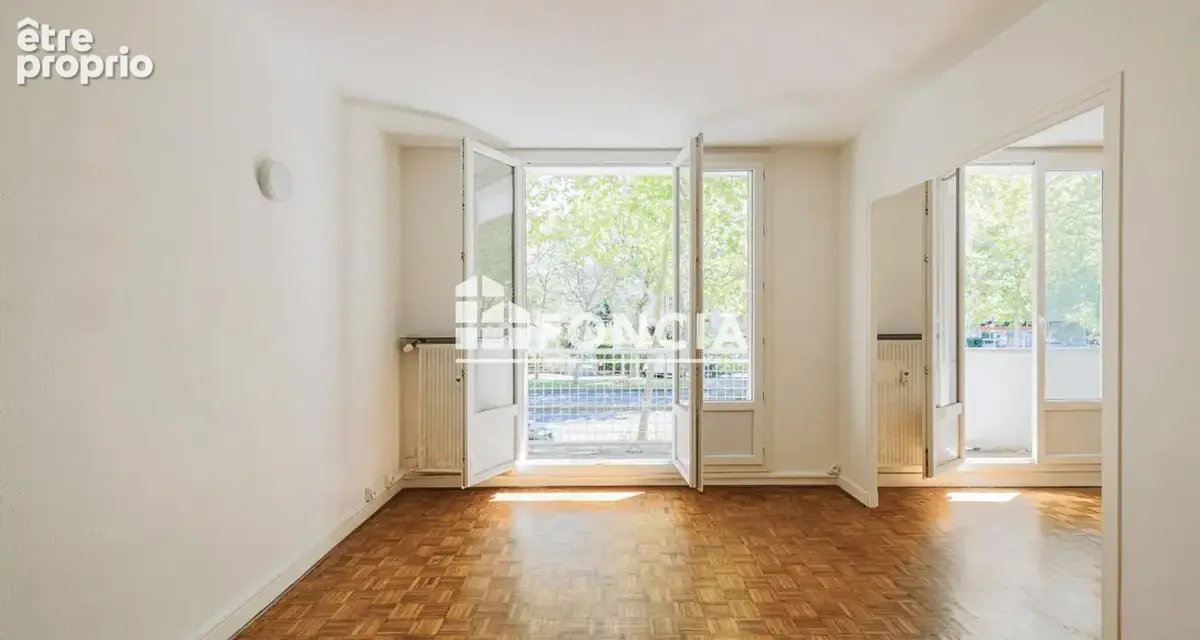 T4 traversant – 66 m² – Ascenseur, cave et parking - photo 4
