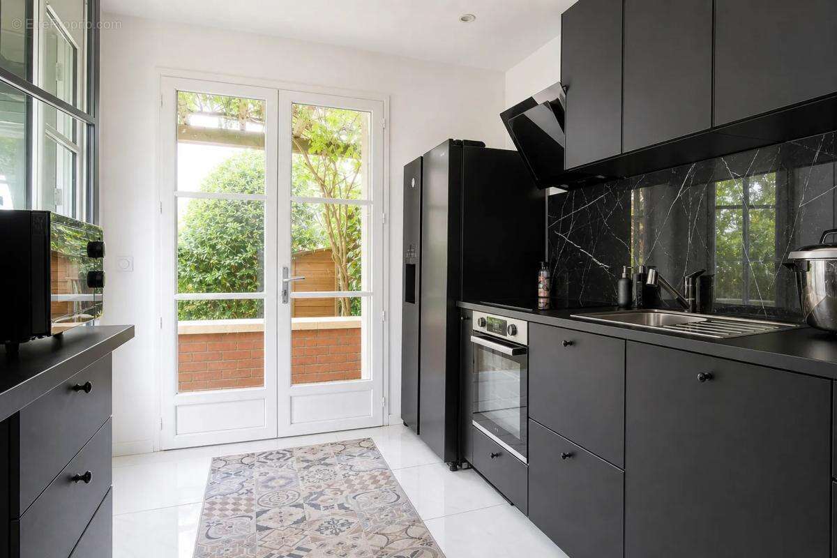 Appartement de 4 pièces de 80 m² situé à Garches - photo 6