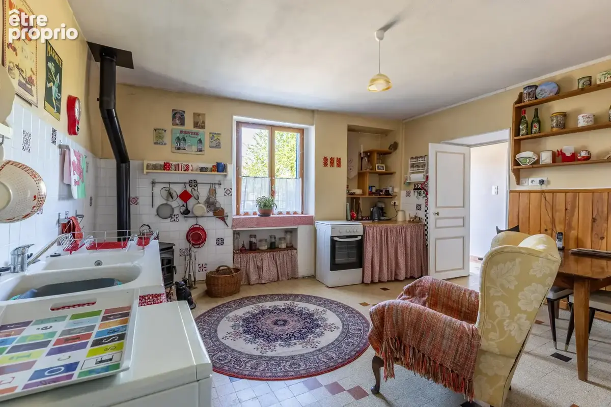 Naves 03330 -maison pierre-terrain- garage-atelier 119 000 euros fai - photo 2