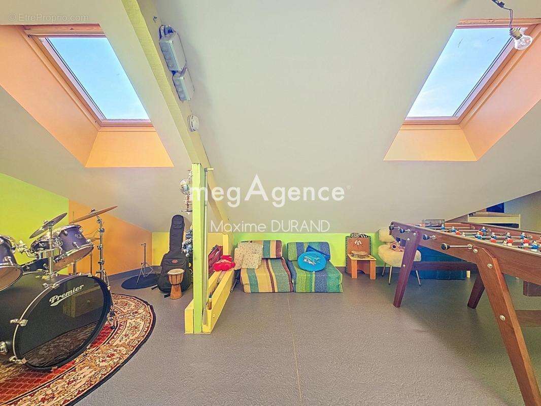 Maison familiale avec vaste pièce de vie et suite parentale de plain-pied à Cholet - photo 12