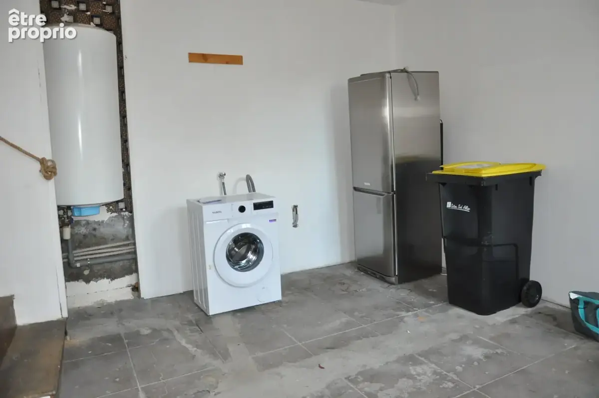 Immeuble de caractère en centre-ville, avec local commercial, duplex et appartement loué - photo 16