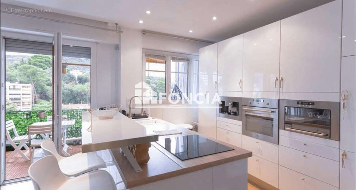 Square carnot t2 dernier etage de 53m2+terrasse 10m2+toit terrasse de 65m2+cave - photo 7