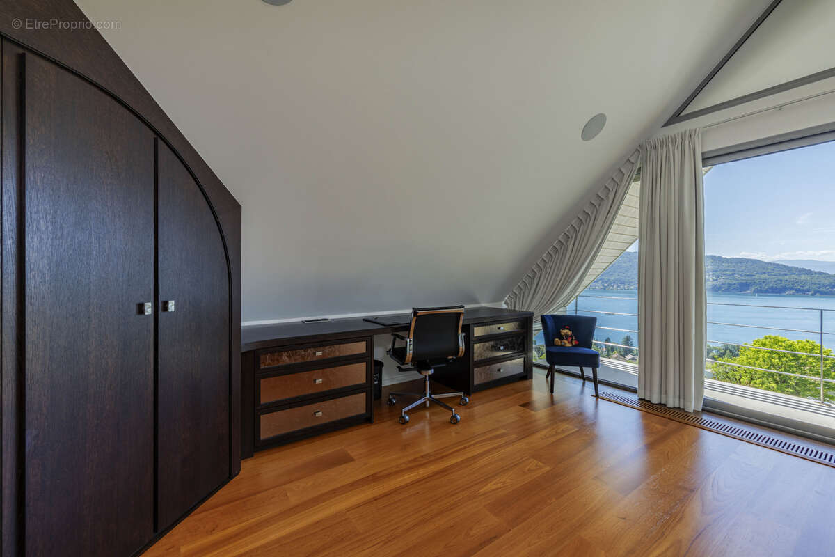 Villa d'exception dominant le lac - photo 26