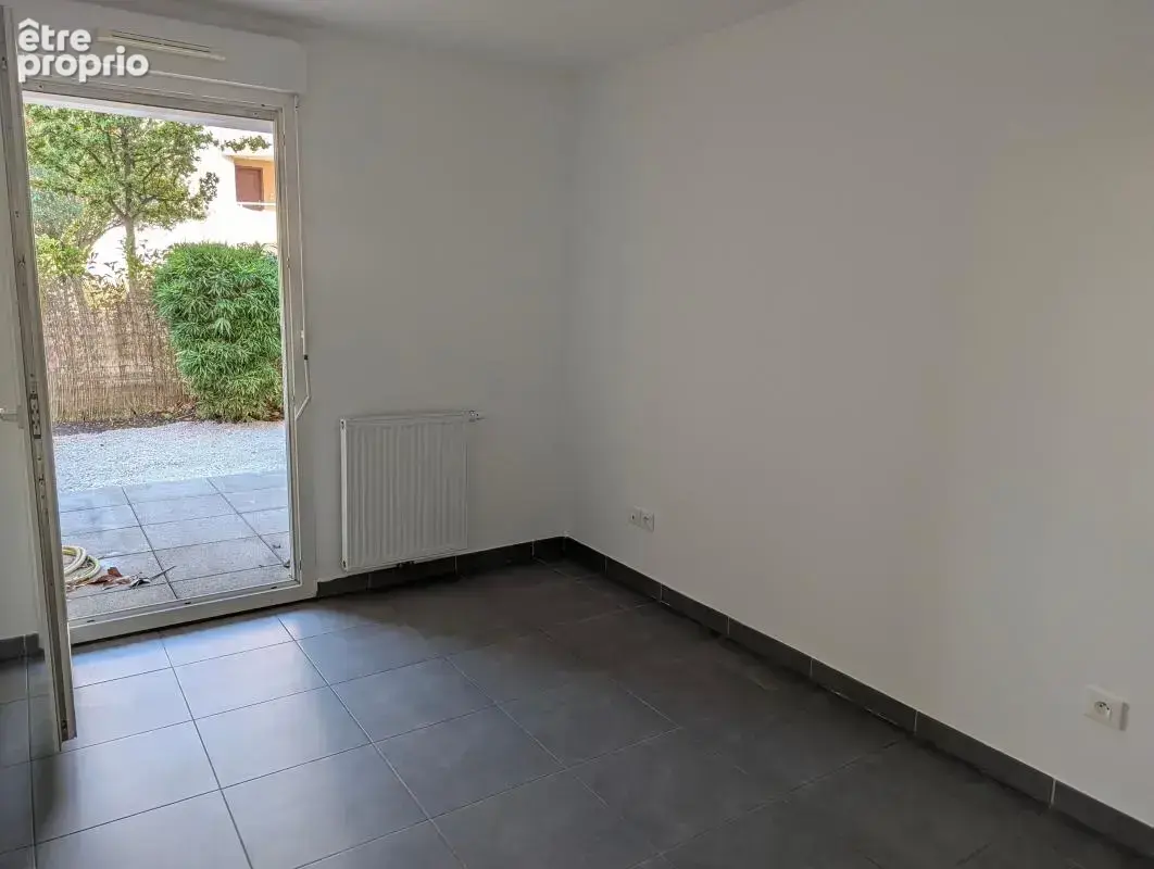 Appartement T3 RDJ avec parking centre ville au calme - photo 7
