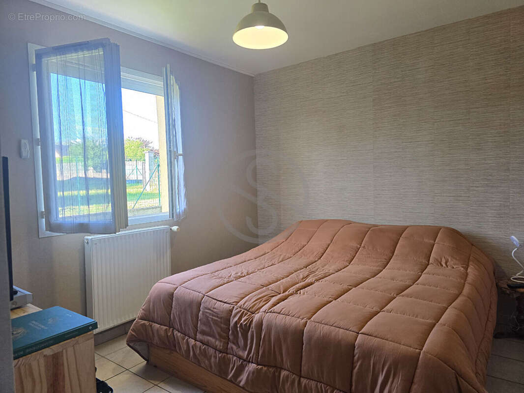 Maison de plain-pied de 126m2 - photo 12