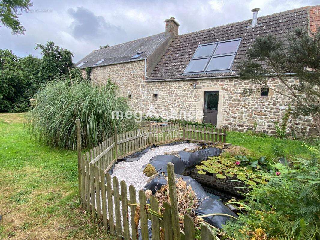 Maison à COSQUEVILLE