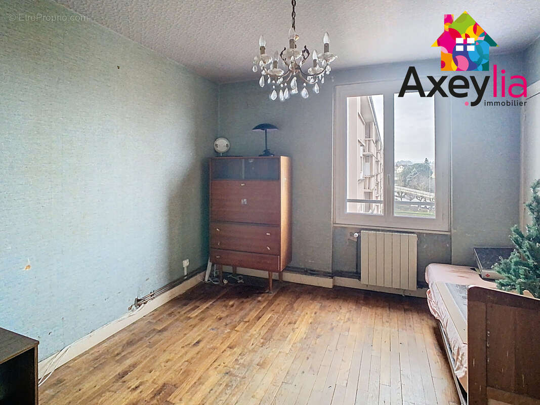 A vendre- roanne- appartement t5 avec balcon, cave et cellier - photo 5