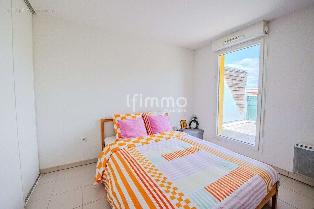 Investissement locatif – T2 avec terrasse et parking - photo 4