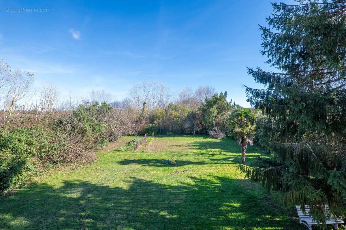  Maison 140 m² + T2 + T3 + Garage – Grand terrain 1 350m² – Saint-Paul-sur-Save - photo 11