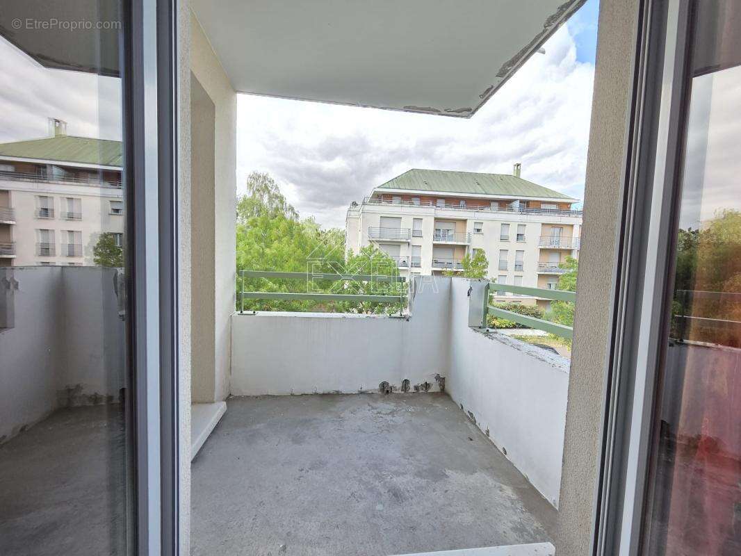 Appartement 3 pièces de 64 m² avec balcon, ascenseur et parking à Mantes-la-Jolie - photo 10