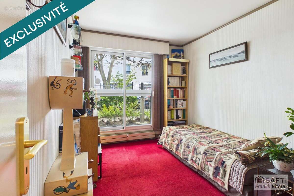 Photo 9 - Appartement à COURBEVOIE