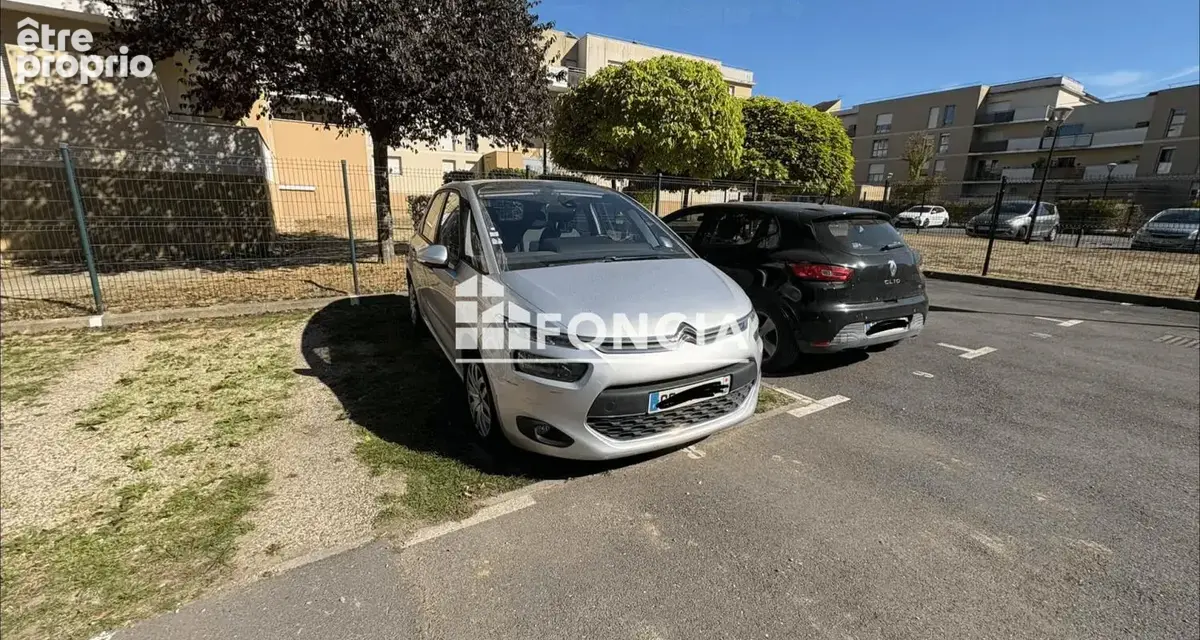 À vendre – place de parking sécurisée et louée - photo 2