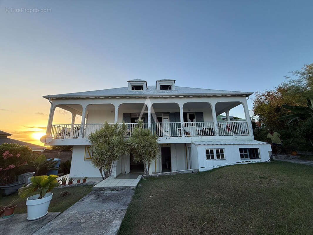 Maison au calme à Saint-François Fort potentiel locatif - photo 15