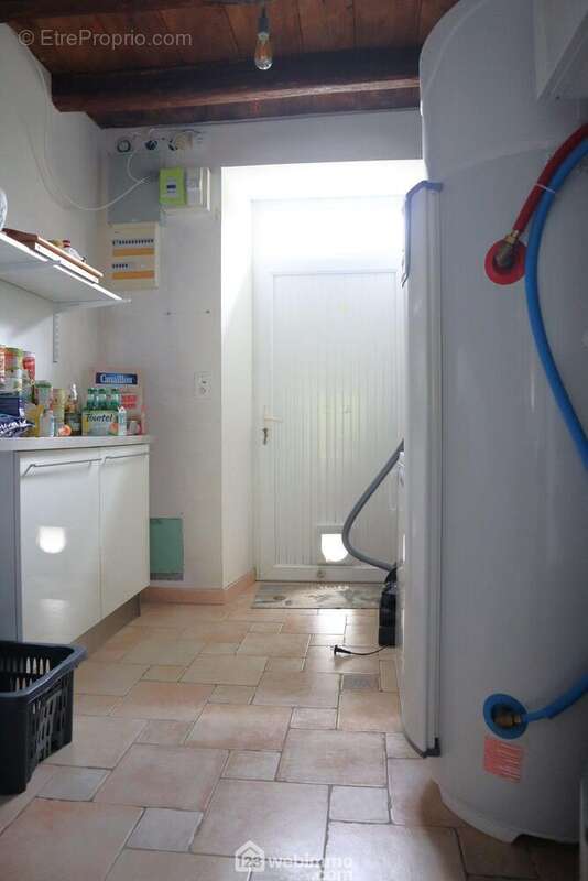Attenante, une buanderie de 7 m2. - Maison à QUEAUX