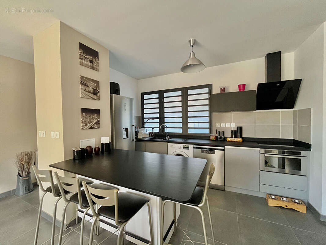 A VENDRE T2 Centre-ville L'Étang-Salé Les Hauts - photo 2