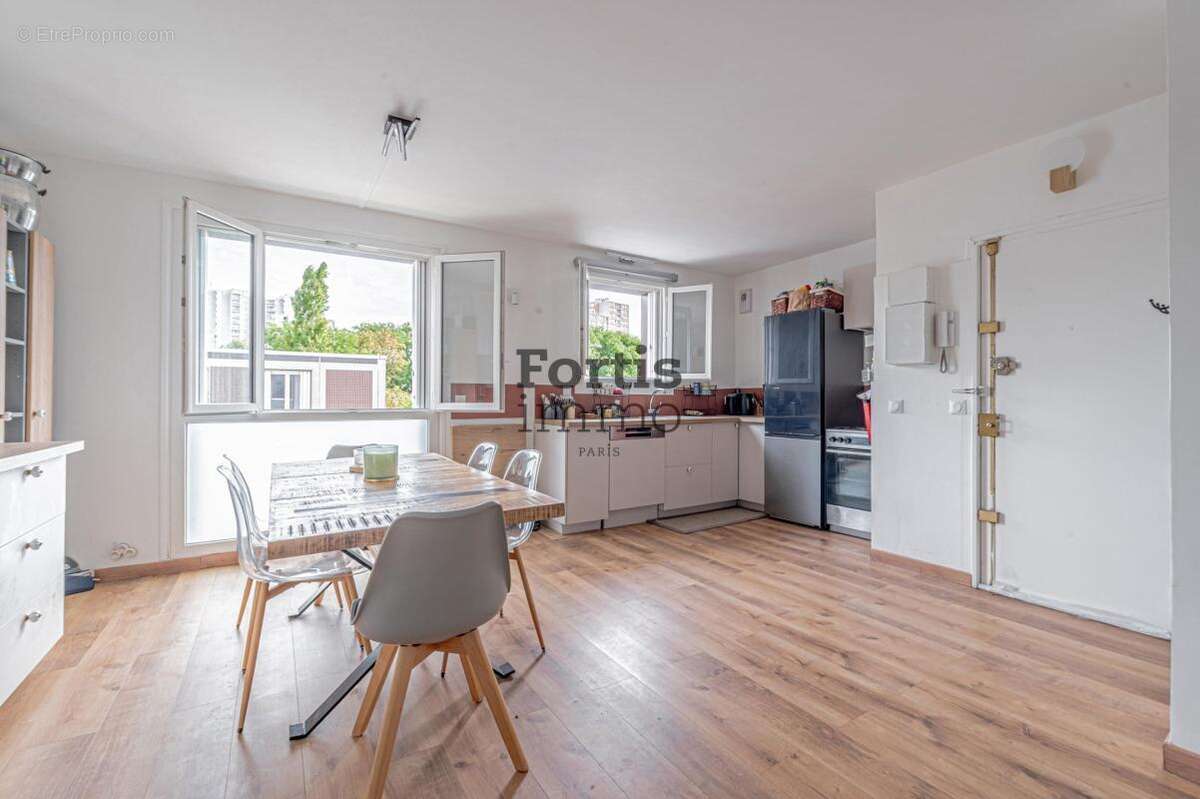 Saint-denis - appartement rénové avec balcon plein sud - photo 7
