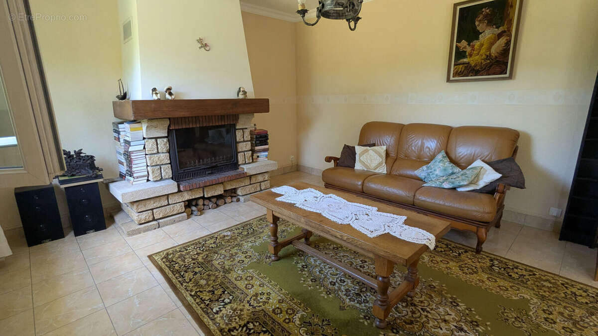 Maison de plain-pied 128 m² avec jardin à Val-de-Reuil 4 chambres - photo 3
