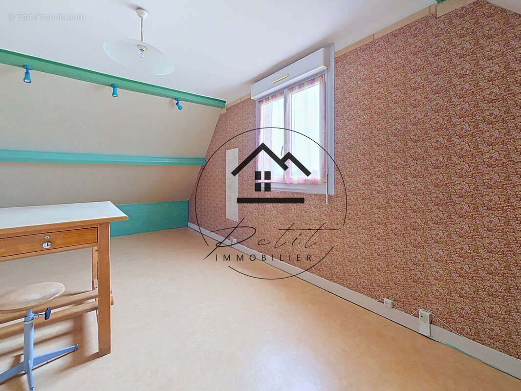 Maison familiale de 107 m2 avec 4 chambres et sous-sol total - photo 12
