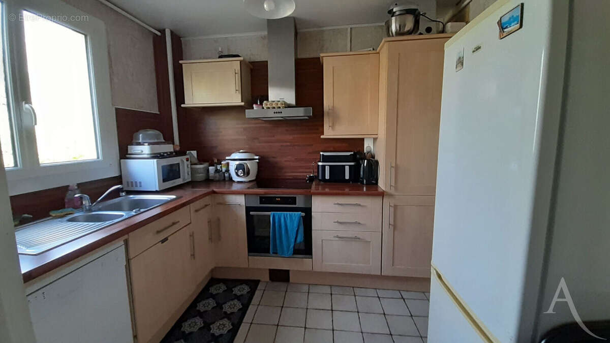 Appartement à CORMELLES-LE-ROYAL
