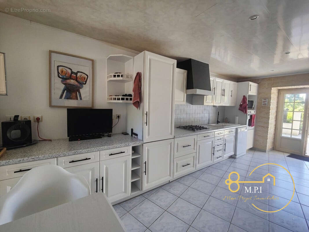 Maison 4 pièces 96 m² à vendre à Saint-Nicolas-Des-Bois (61250) - photo 2